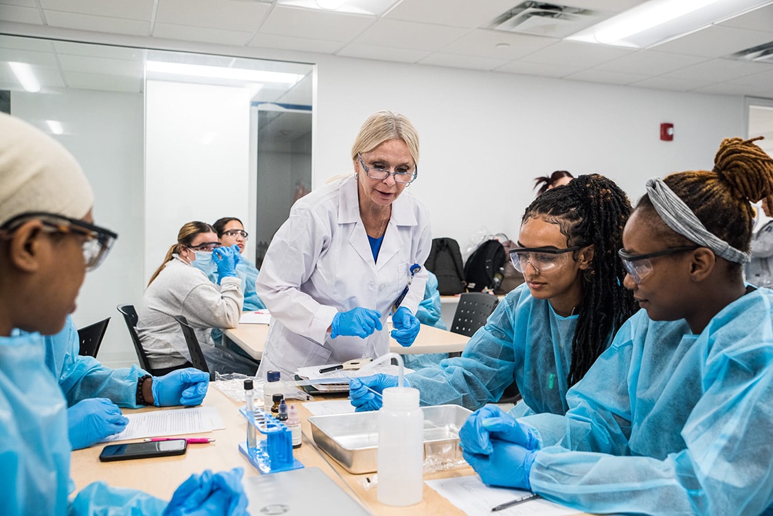 Ontario Nursing School Near Me AZCN   Nursing Program Students And Teacher In Lab Coat 