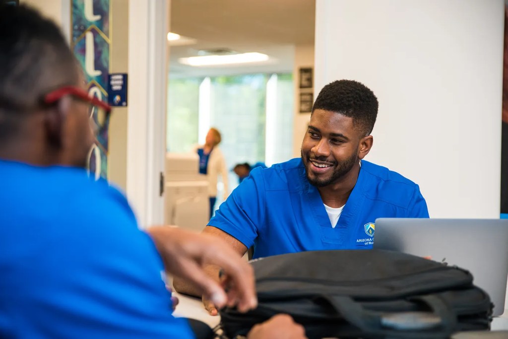 Students at desk on BSN program start date