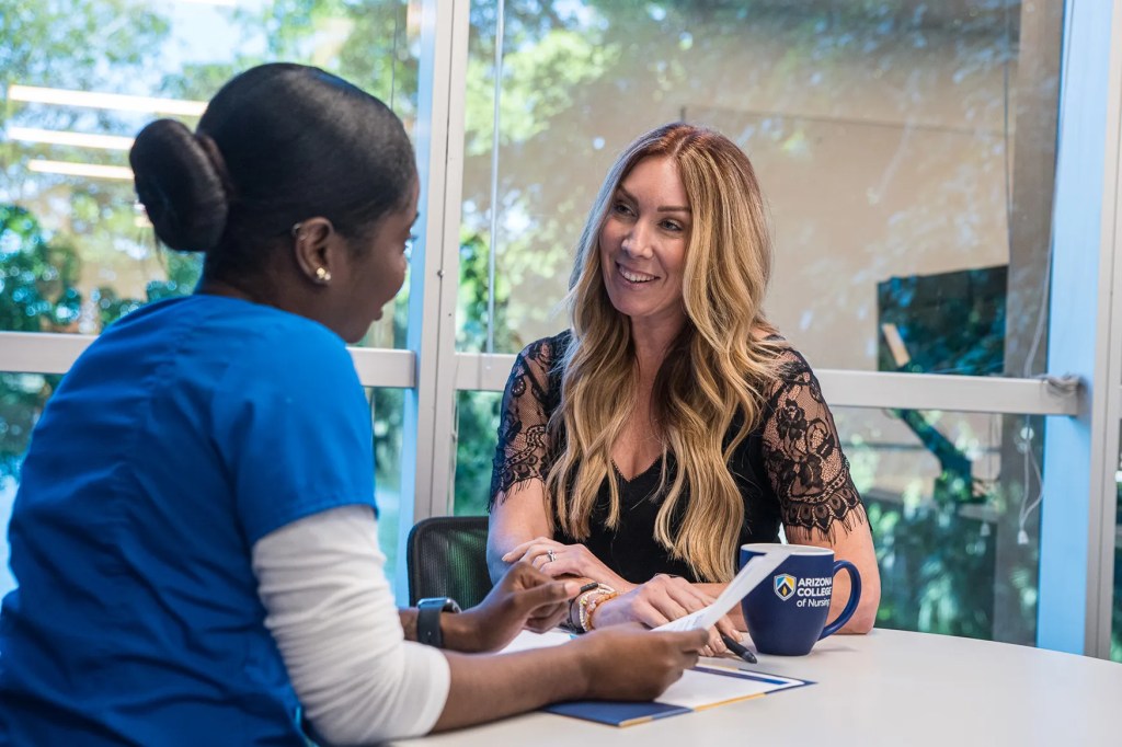 Nursing program faculty and student discussing BSN Degree goals at AZCN.