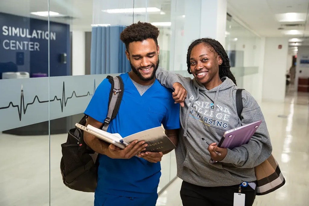 BSN Degree students at AZCN in hallway of campus at nursing school near you