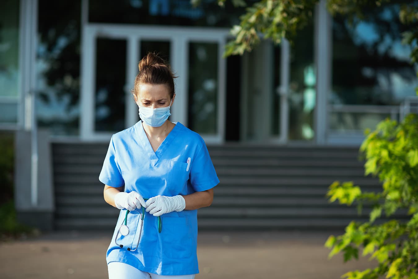 Image of registered nurse outside medical clinic