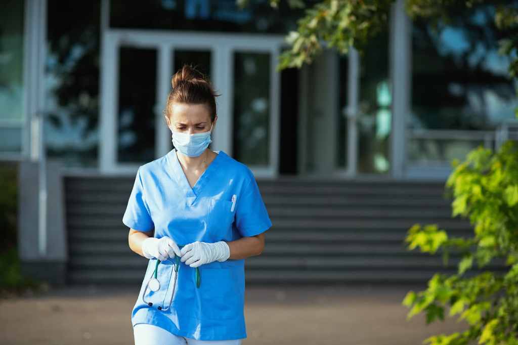 Image of registered nurse outside medical clinic
