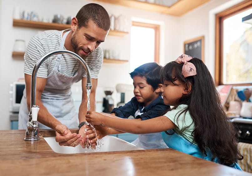 family washing hands