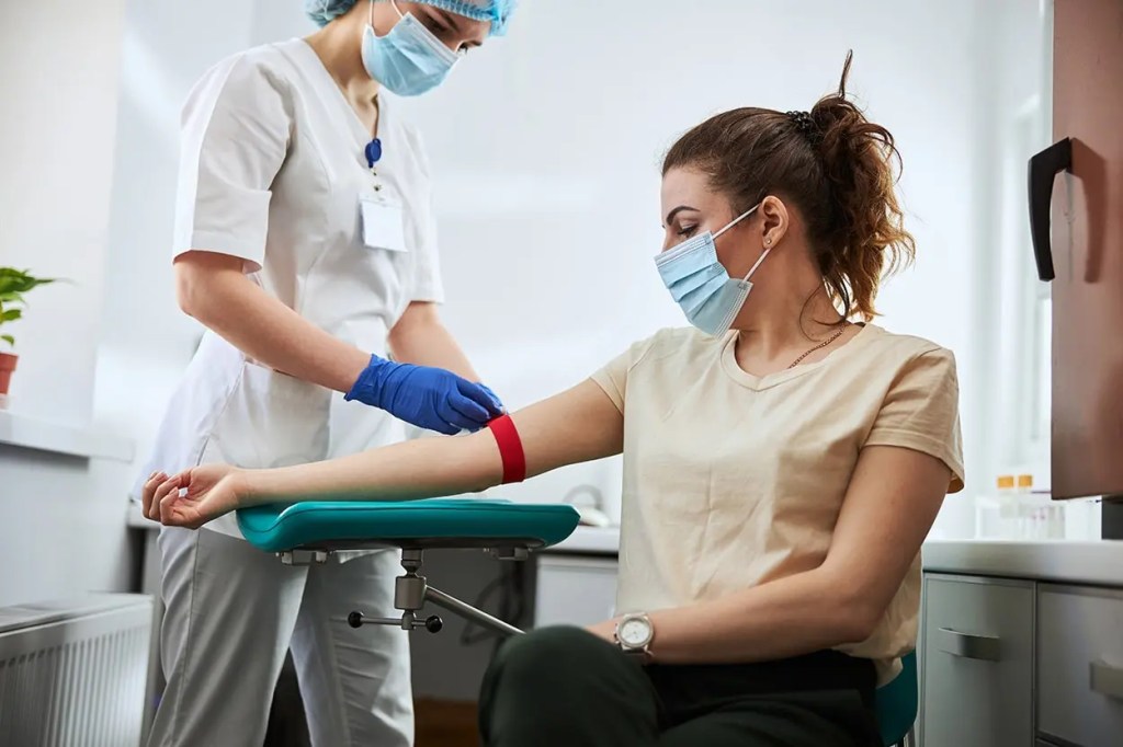 Phlebotomy Program students on campus in lab