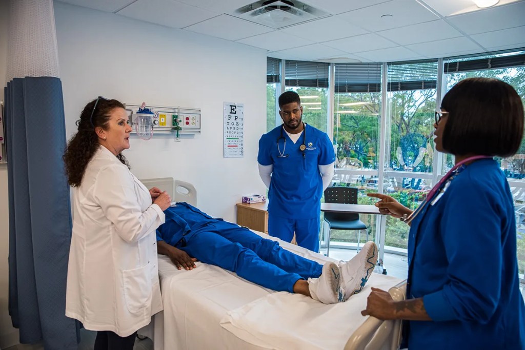 Students learning in a nursing simulation lab